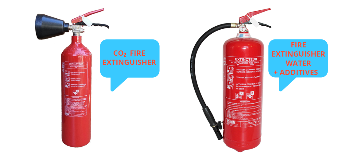 Picture showing two fire extinguishers: one is marked CO2 fire extinguisher, the other water + additive fire extinguisher