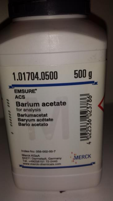 Photo of a plastic container. The label in English indicates that the content is barium acetate